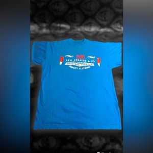 Vintage LEVIS slightly worn retro blue branded tee!!